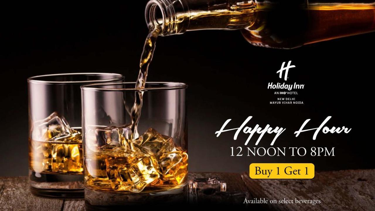 Holiday Inn New Delhi Mayur Vihar Noida, an IHG Hotel Bagian luar foto A poster advertising a happy hour